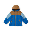 Color-blocked jacket with brown, blue, and light blue sections on a white background