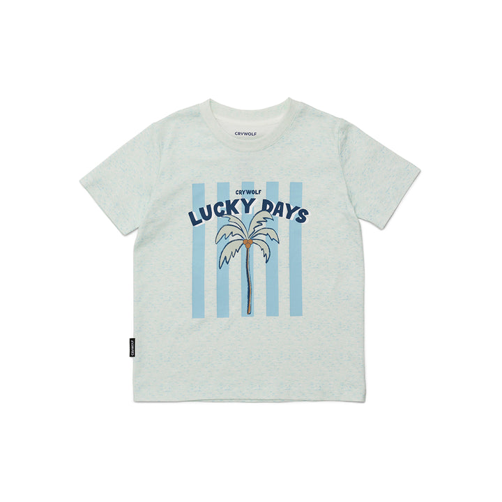 Light blue crywolf t-shirt with 'Lucky Days' graphic and palm tree design on a white background