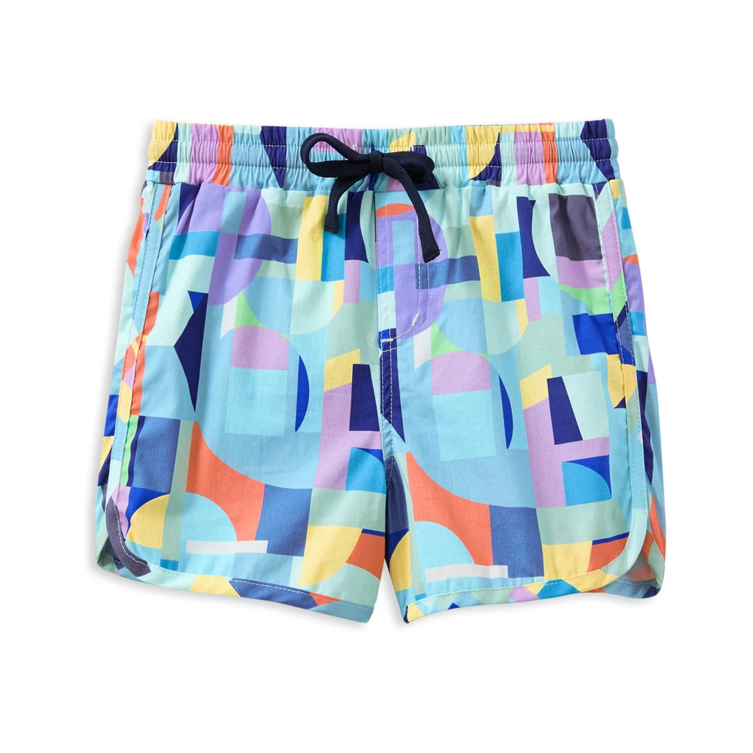Colorful geometric patterned shorts on a white background