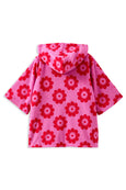 Pink floral-patterned towel on a white background