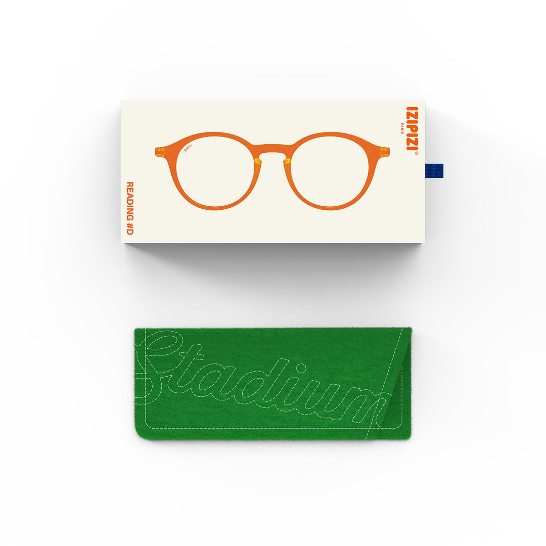 Green glasses case with 'Stadium' text and a white card with orange glasses illustration on a white background