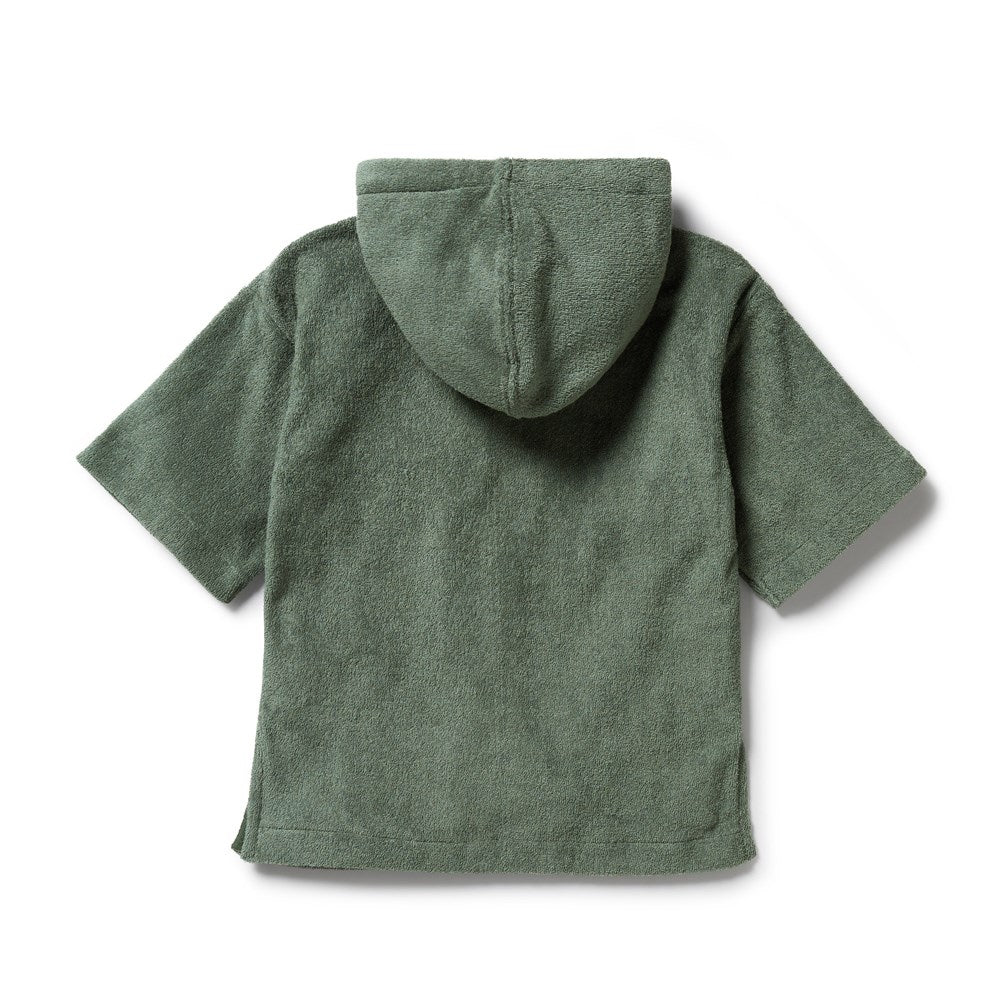 Green hooded towel on a white background