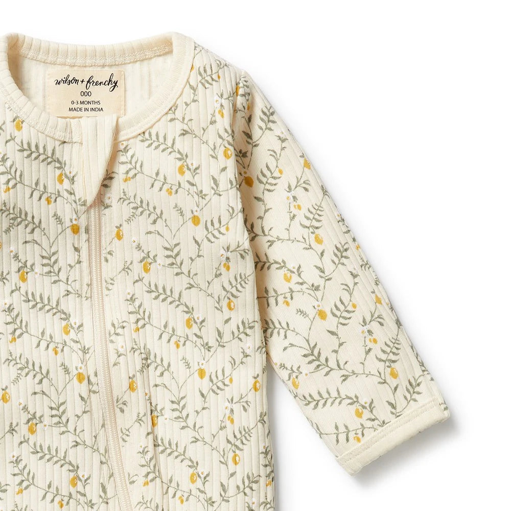 Wilson & frenchy Baby onesie with floral pattern on a white background