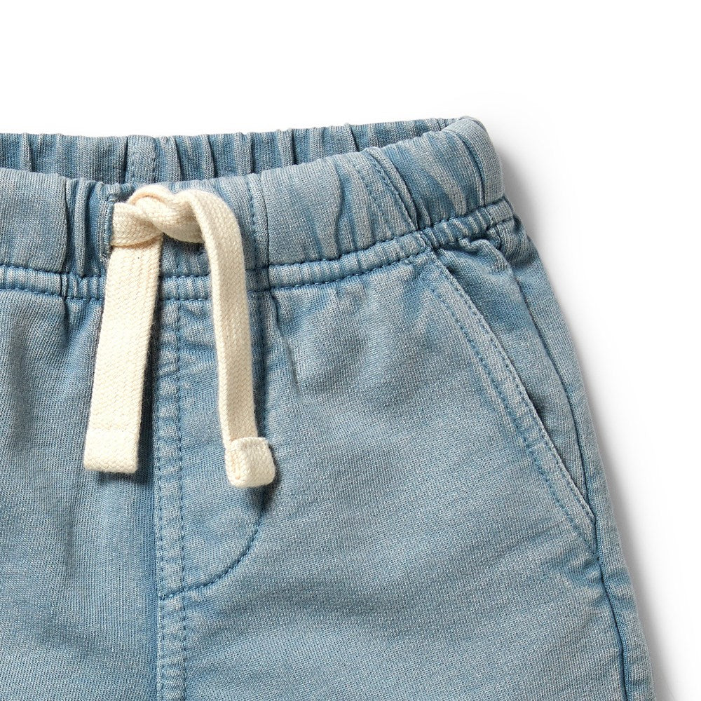 Close-up of wilson & frenchy blue denim shorts with a drawstring on a white background