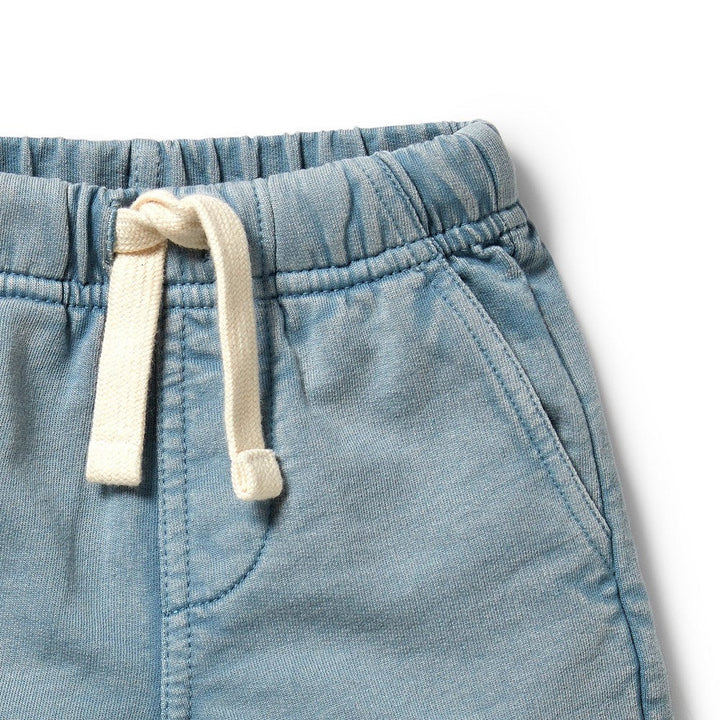 Close-up of wilson & frenchy blue denim shorts with a drawstring on a white background