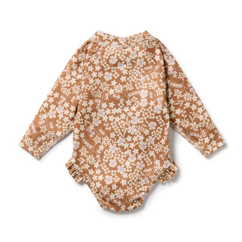 Wilson & Frenchy Floral-patterned baby romper on a white background