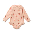 Pink baby Wilson & Frenchy onesie with strawberry pattern on a white background