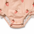 Pink baby Wilson & frenchy onesie with strawberry pattern on a white background