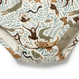 Patterned fabric with animals and leaves on a white background
