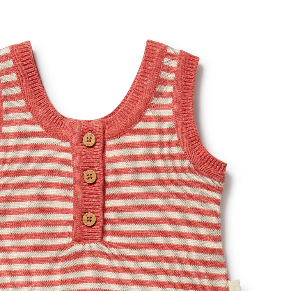 Red and white striped sleeveless top with wooden buttons on a white background