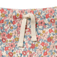 Floral patterned fabric with a white drawstring