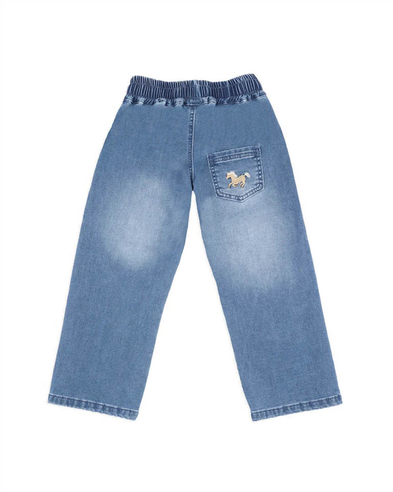 Light blue jeans with a small pocket patch on a white background