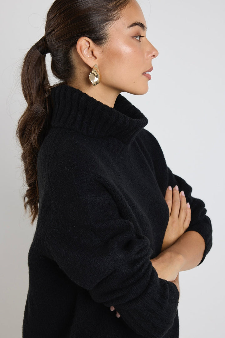 Your new favourite knit? The Zealous knit is a gorgeous top that features raglan sleeves, a roll neckline and ultra-soft chunky knit fabric that you'll love to wear again and again. Available from www.thecollectivenz.com