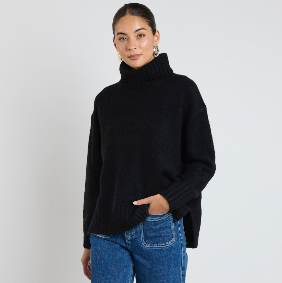 Your new favourite knit? The Zealous knit is a gorgeous top that features raglan sleeves, a roll neckline and ultra-soft chunky knit fabric that you'll love to wear again and again. Available from www.thecollectivenz.com