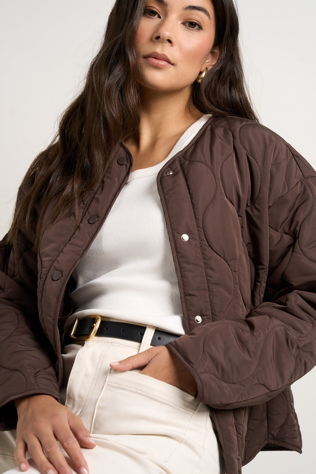 Stay cosy while keeping effortlessly chic in this chocolate quilted puffer jacket. With its lightweight yet warm design, this is the perfect layering piece to transition through the seasons. Available from www.thecollectivenz.com