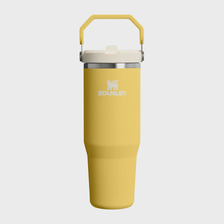 Yellow Stanley insulated tumbler on a white background
