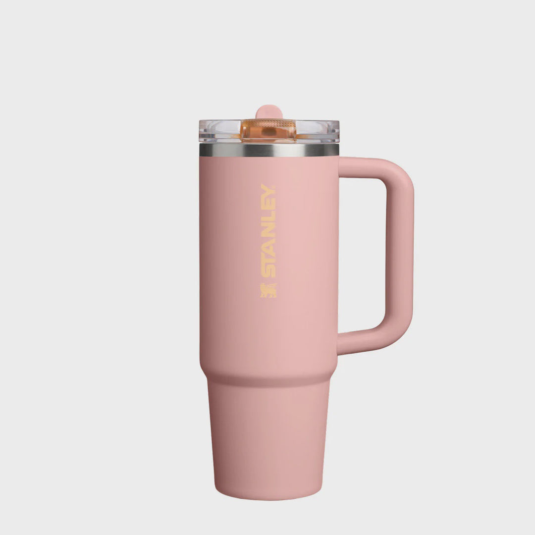 Pink Stanley tumbler on a white background