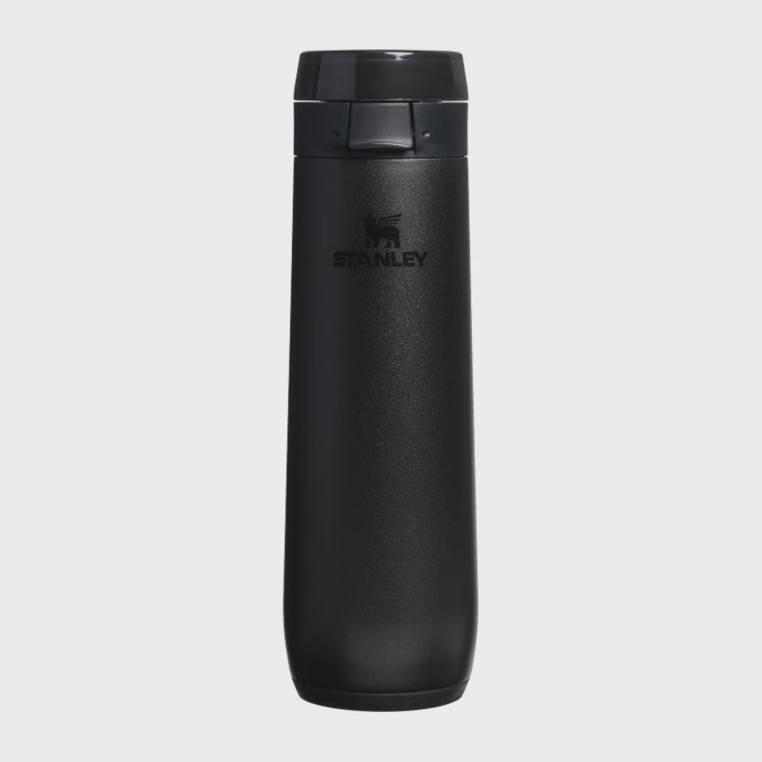 A black Stanley travel tumbler with a matching black lid, shown vertically against a light gray background.