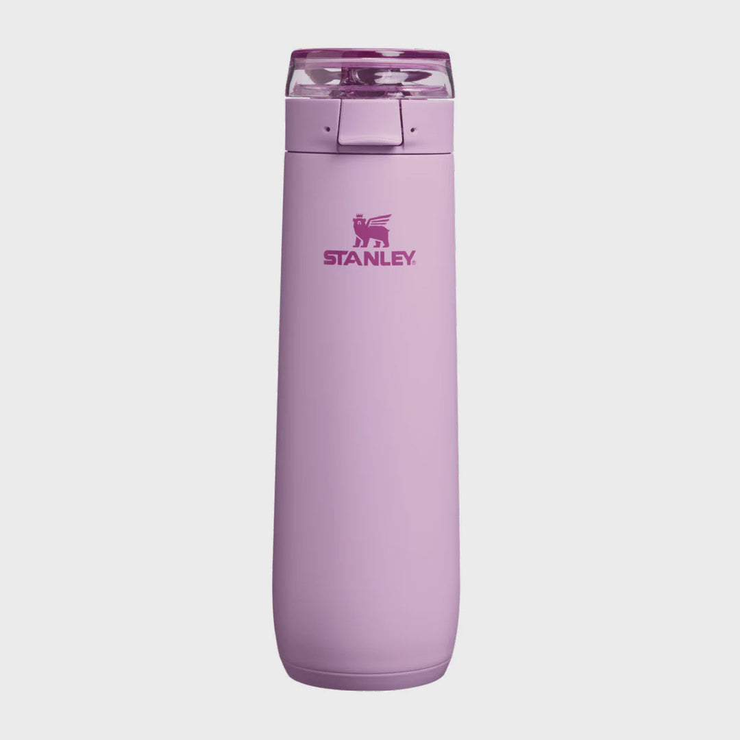 A Stanley insulated water bottle in a dusty lavender-purple color, featuring the Stanley logo on the front and a matching purple lid, set against a plain light gray background.