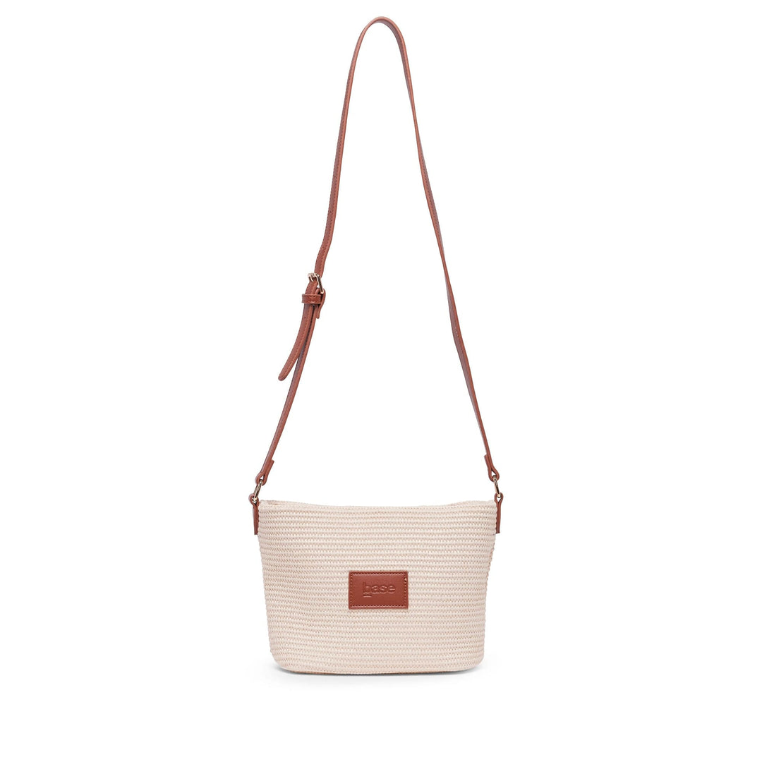 Beige handbag with a brown strap on a white background