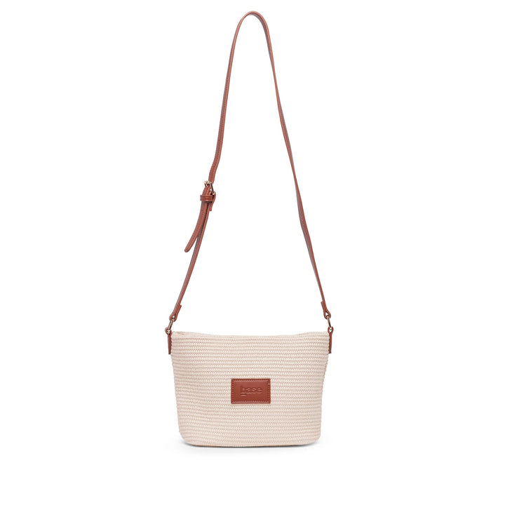 Beige handbag with a brown strap on a white background