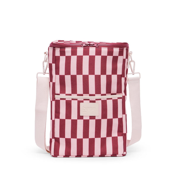 Red and white checkered cooler  bag with a strap on a white background