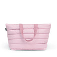 Pink quilted tote bag on a white background