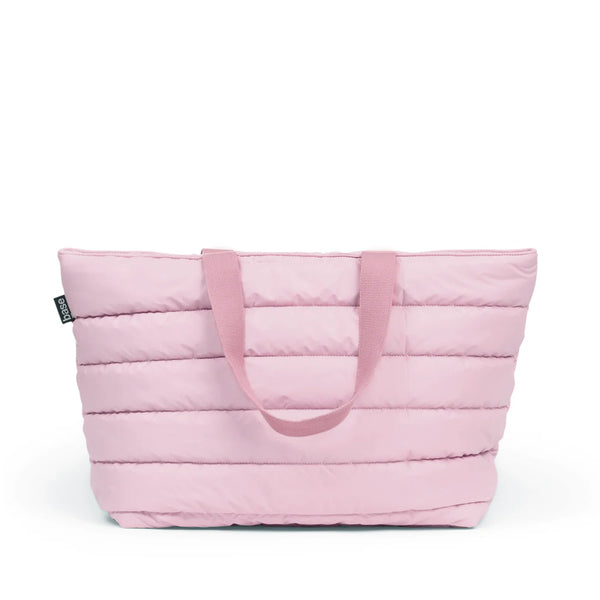 Pink quilted tote bag on a white background