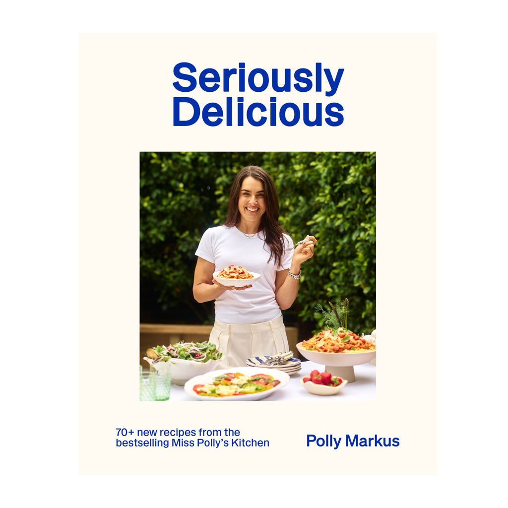 Book cover of 'Seriously Delicious' by Polly Markus featuring a woman with food.