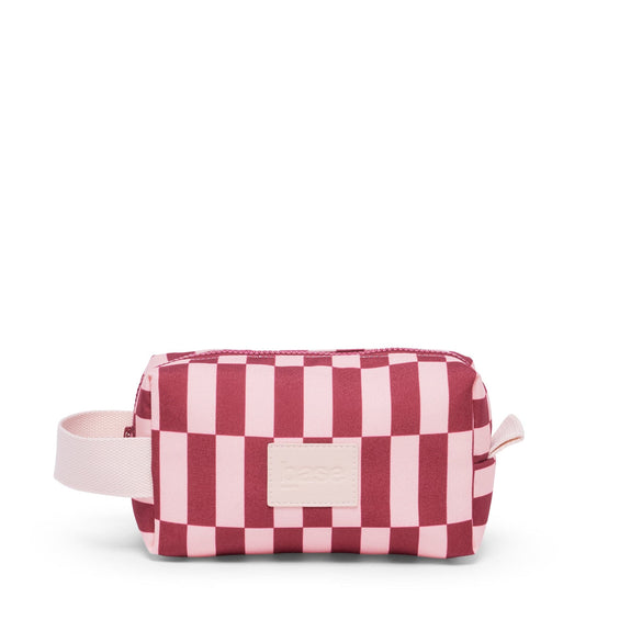 Pink and red checkered bag with a strap on a white background