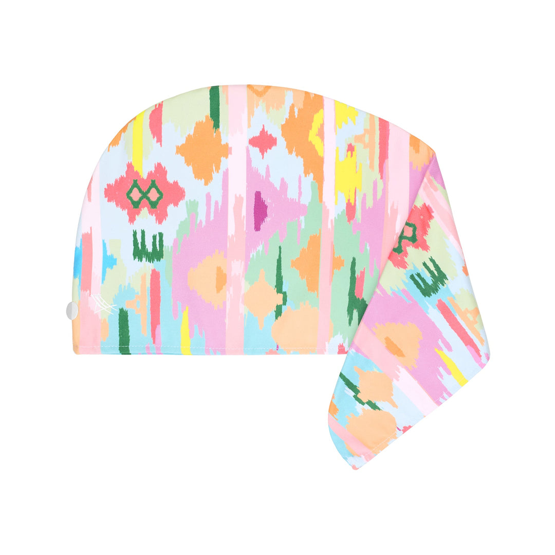 Colorful patterned headscarf on a white background