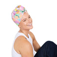 Woman wearing a colorful headscarf on a white background