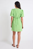 Feel ultra chic in the Emory apple green mini dress from Stories be Told, available from www.thecollectivenz.com