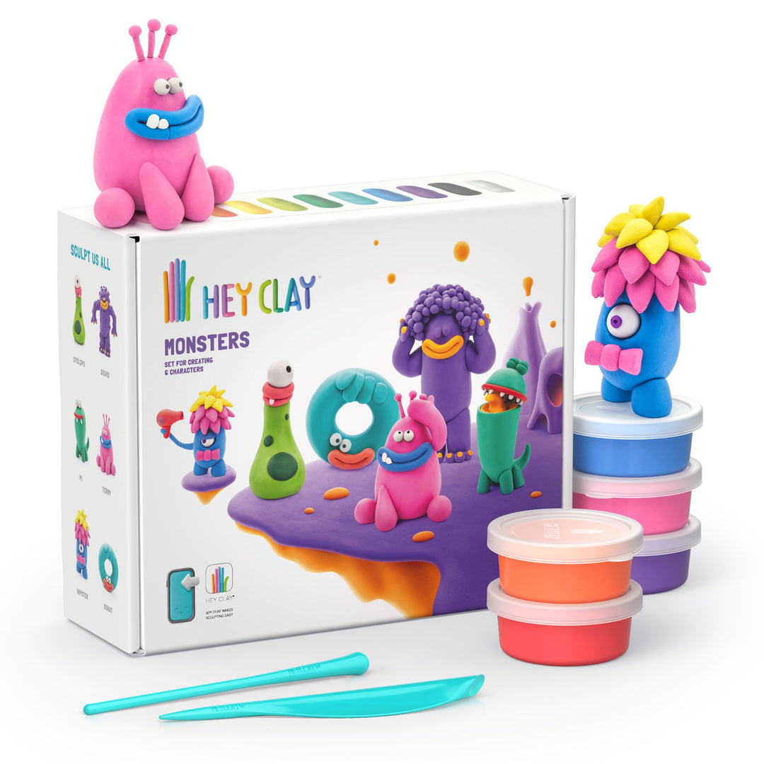 Hey Clay Monsters playset with figures, packaging, and tools on a white background