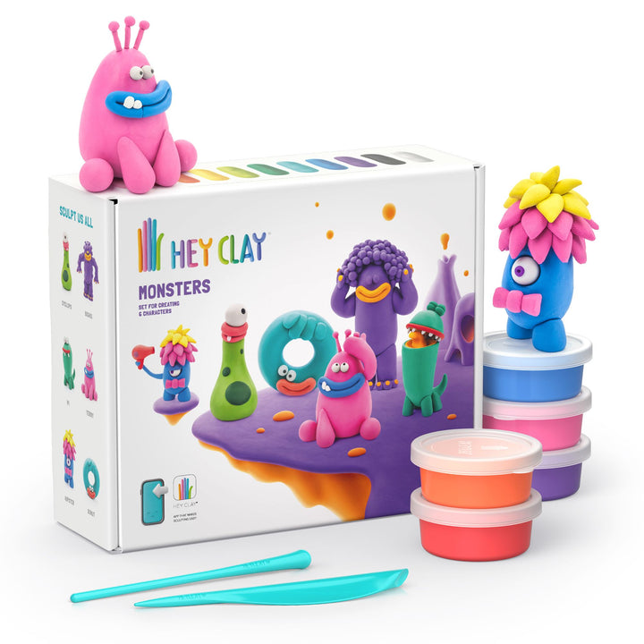 Hey Clay Monsters playset with figures, packaging, and tools on a white background