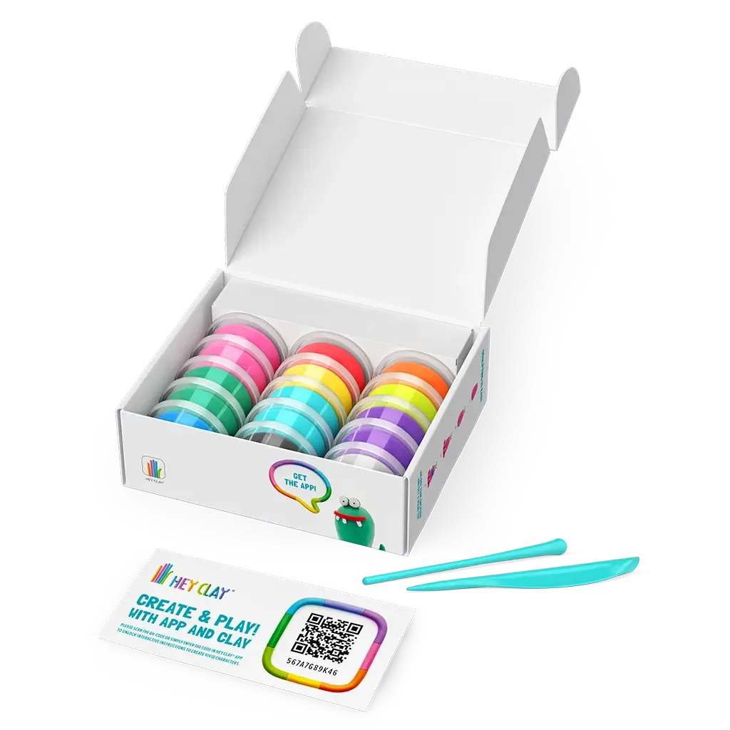 Box of colorful clay pots with tools on a white background