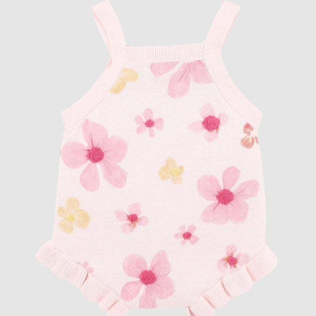 Pink floral dress on a light gray background