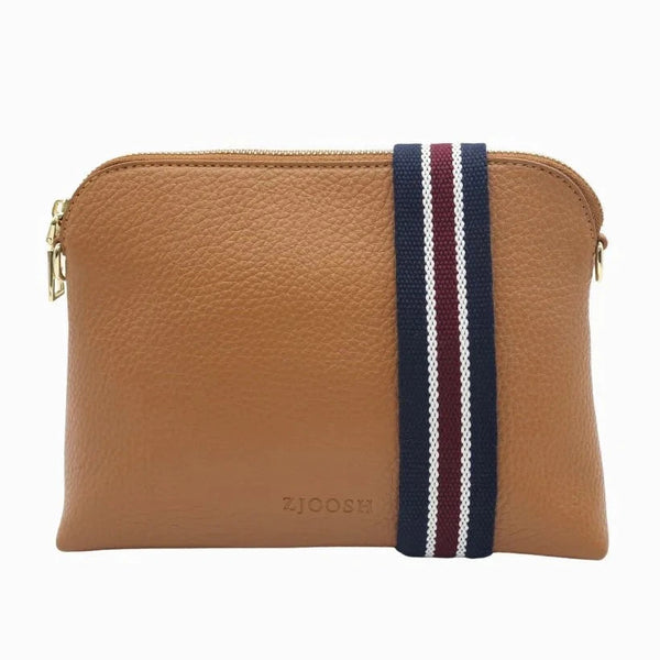 Our Hudson Cross Body Bag combines style and function with two removable straps: a classic PU strap with gold chain and a playful striped webbing strap. Available from www.thecollectivenz.com