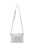 Our Hudson Cross Body Bag combines style and function with two removable straps: a classic PU strap with gold chain and a playful striped webbing strap. Available from www.thecollectivenz.com