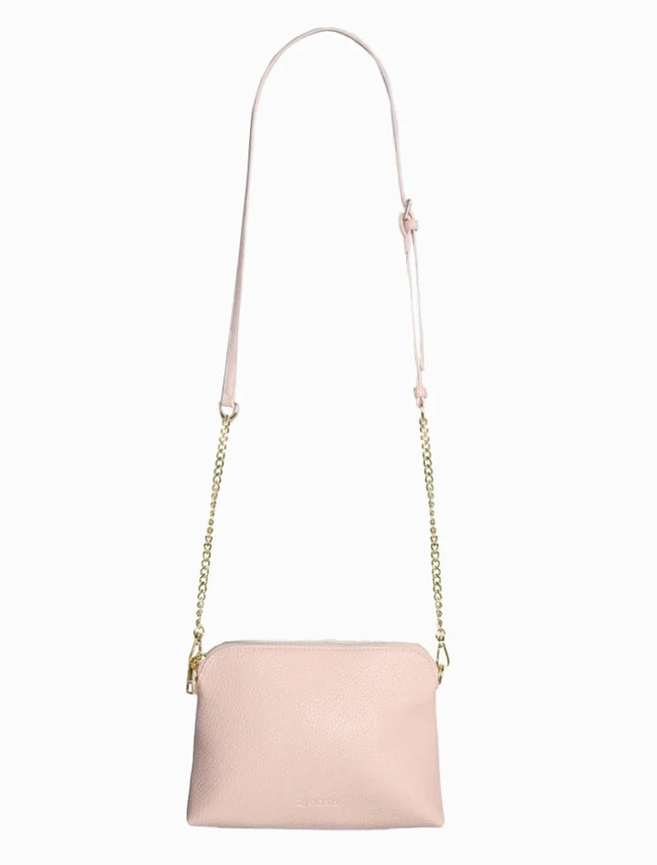 Our Hudson Cross Body Bag combines style and function with two removable straps: a classic PU strap with gold chain and a playful striped webbing strap. Available from www.thecollectivenz.com