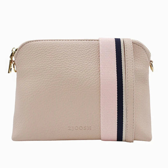 Our Hudson Cross Body Bag combines style and function with two removable straps: a classic PU strap with gold chain and a playful striped webbing strap. Available from www.thecollectivenz.com