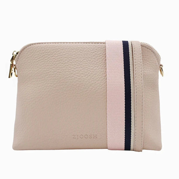 Our Hudson Cross Body Bag combines style and function with two removable straps: a classic PU strap with gold chain and a playful striped webbing strap. Available from www.thecollectivenz.com