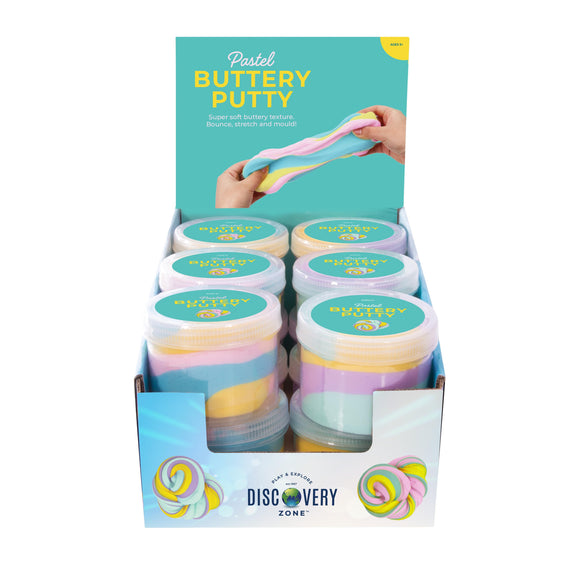 Display box of pastel buttery putty with Discovery Zone branding.