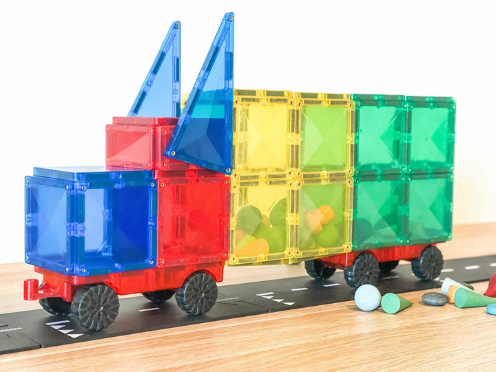 Connectix Colorful toy truck with transparent containers on a wooden surface