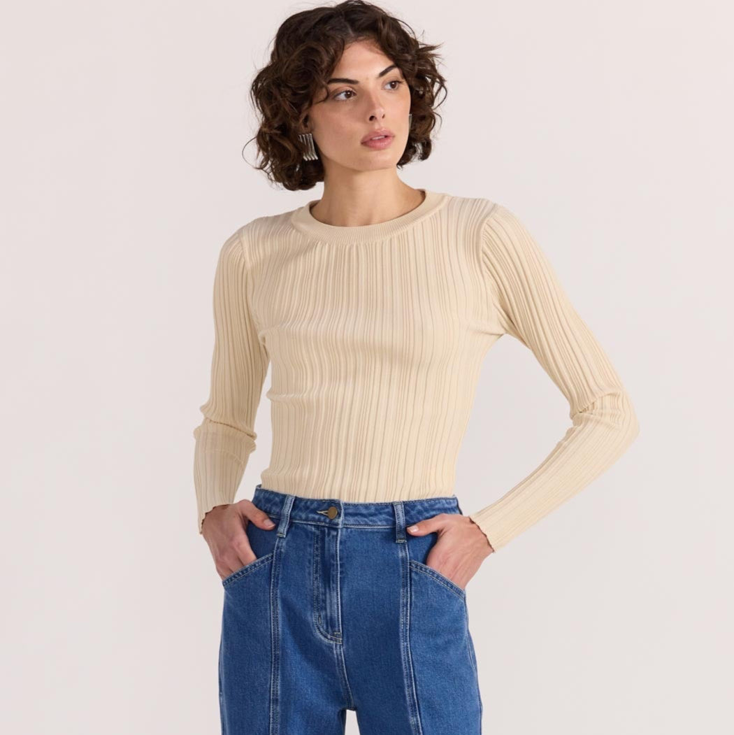 The Kyra Knit Top by Staple the Label is a timeless wardrobe essential. Featuring a fitted silhouette, and stretchy rib knit fabrication. Available from www.thecollectivenz.com