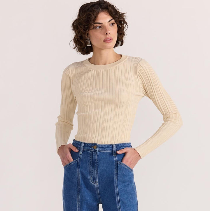 The Kyra Knit Top by Staple the Label is a timeless wardrobe essential. Featuring a fitted silhouette, and stretchy rib knit fabrication. Available from www.thecollectivenz.com