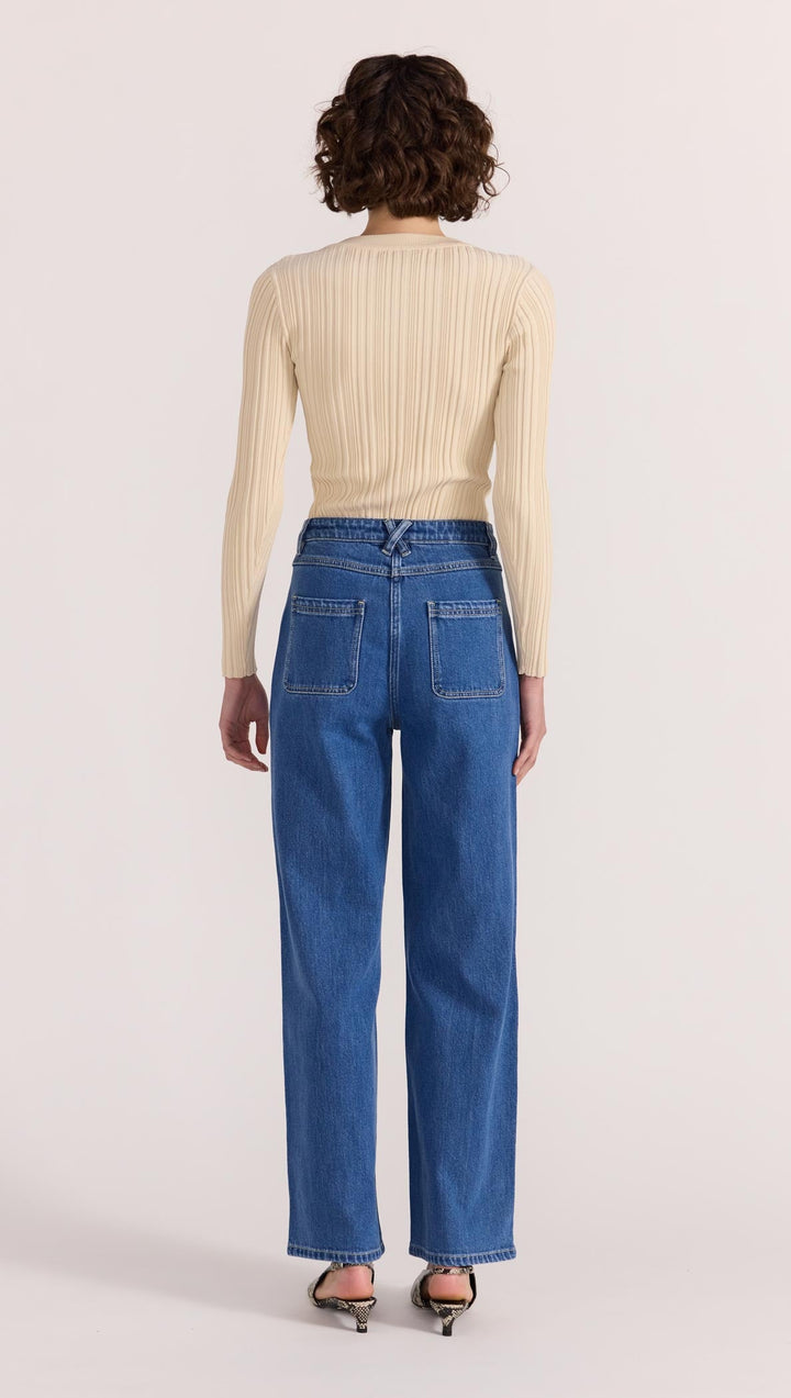 The Kyra Knit Top by Staple the Label is a timeless wardrobe essential. Featuring a fitted silhouette, and stretchy rib knit fabrication. Available from www.thecollectivenz.com