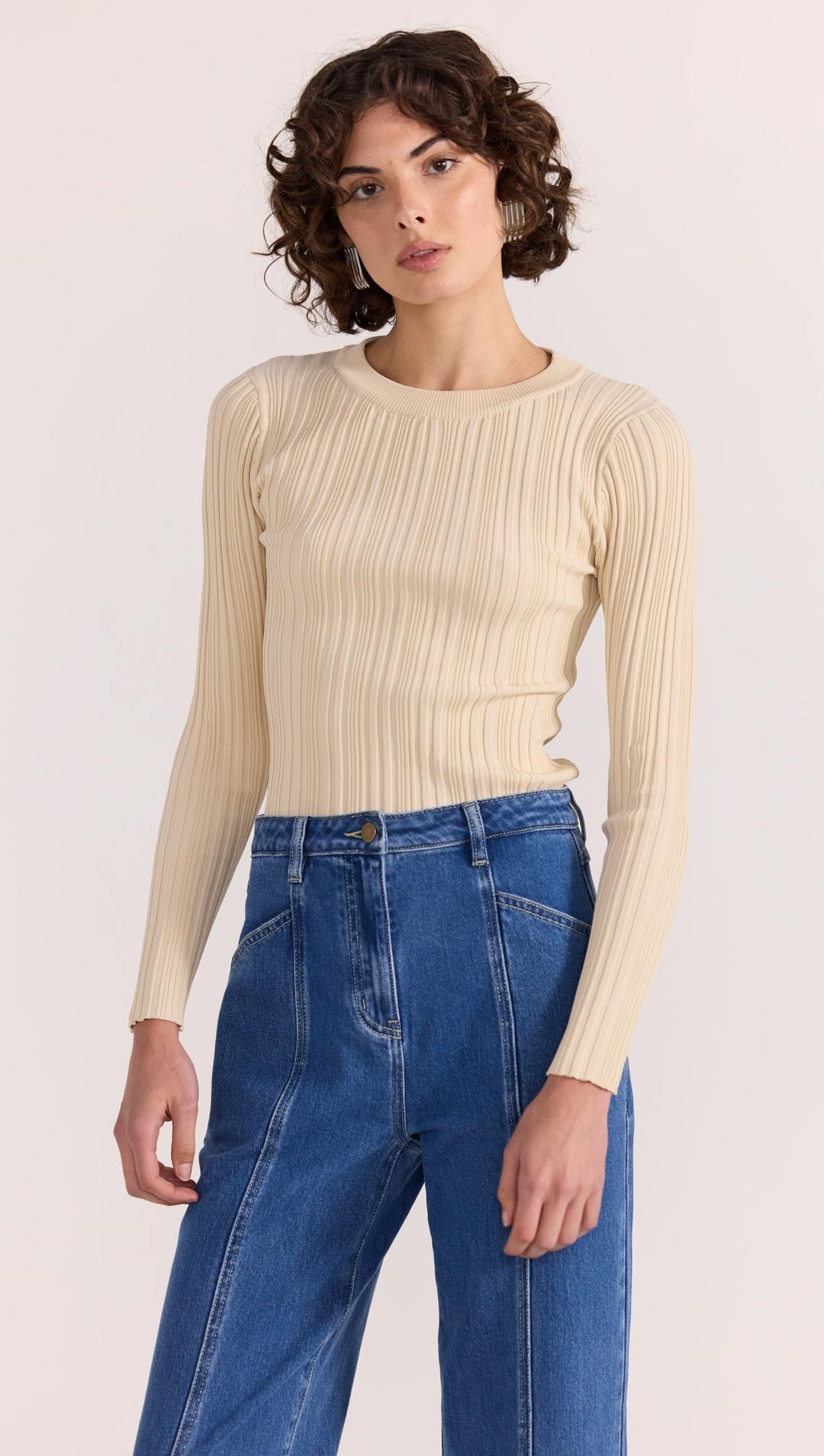 The Kyra Knit Top by Staple the Label is a timeless wardrobe essential. Featuring a fitted silhouette, and stretchy rib knit fabrication. Available from www.thecollectivenz.com