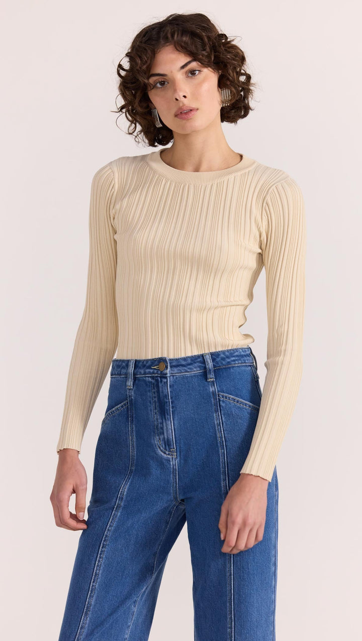 The Kyra Knit Top by Staple the Label is a timeless wardrobe essential. Featuring a fitted silhouette, and stretchy rib knit fabrication. Available from www.thecollectivenz.com