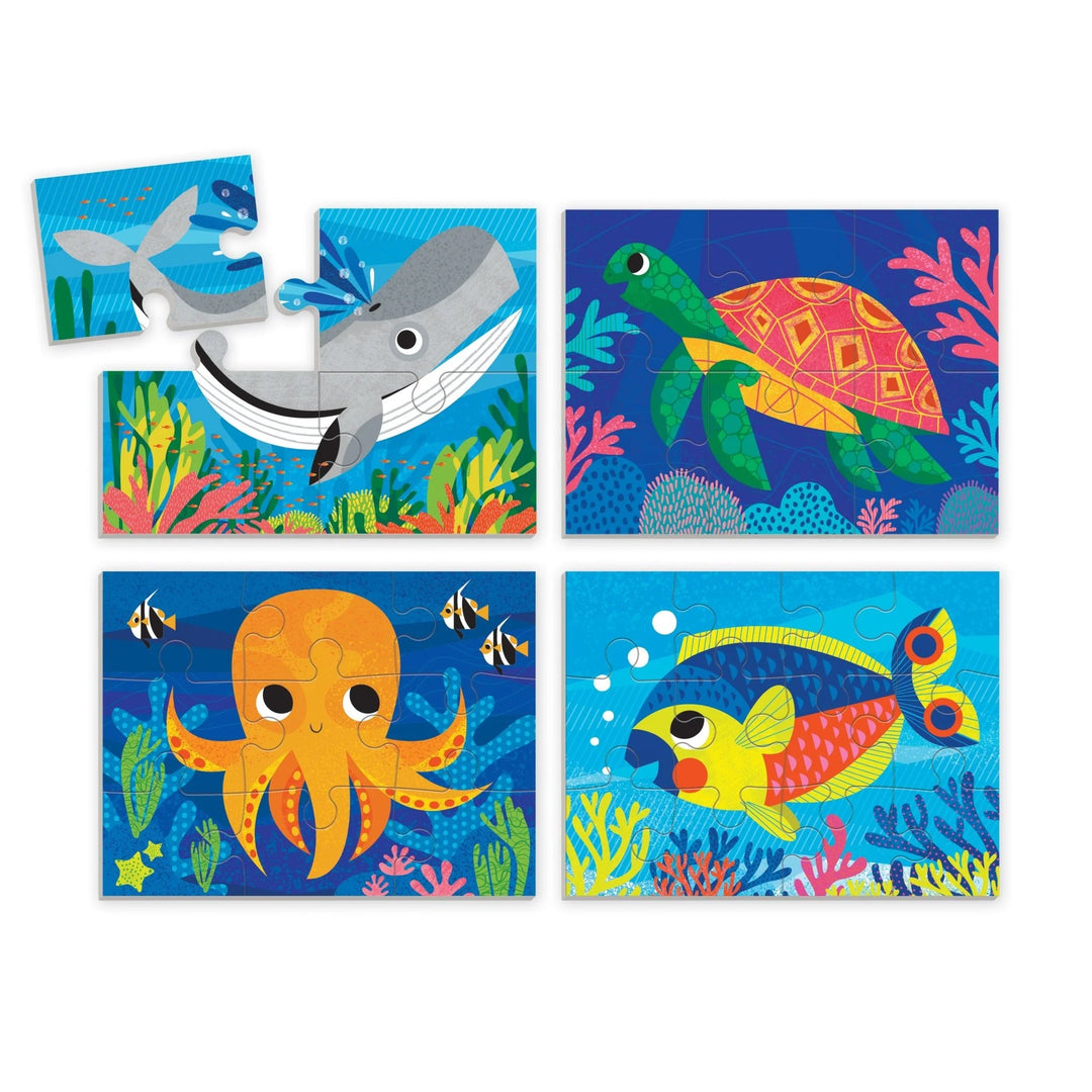 Set of four colorful children's puzzles featuring marine animals on a white background.